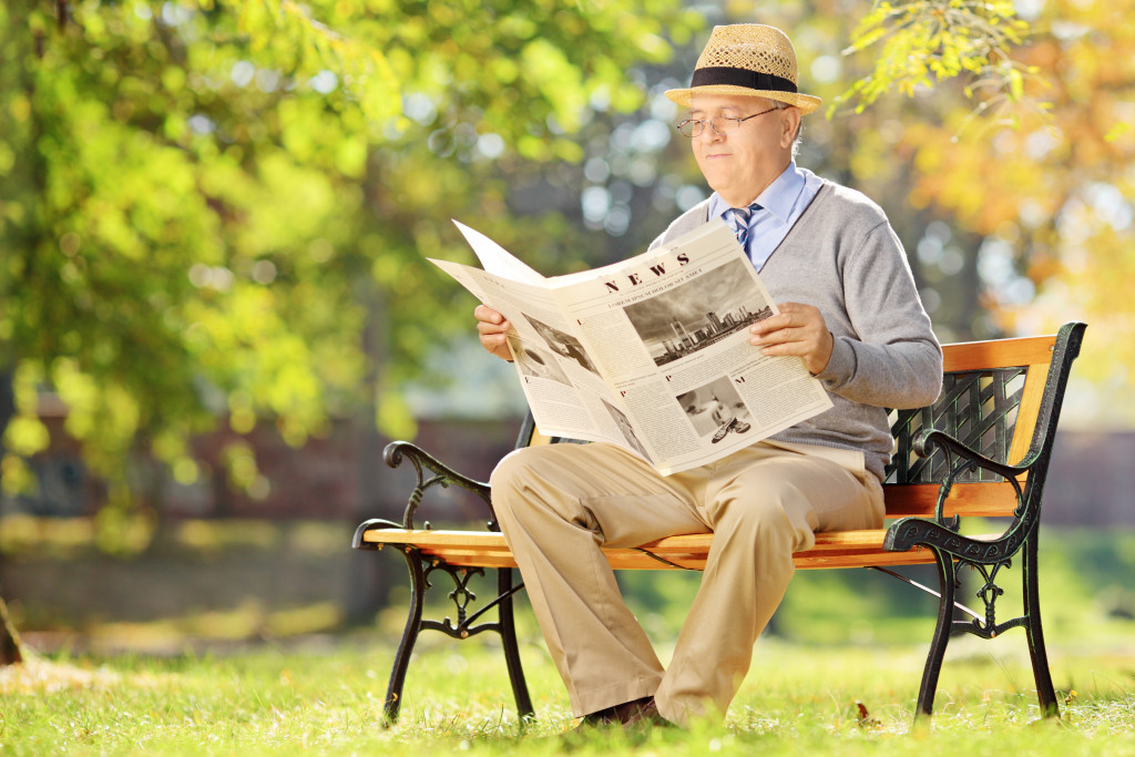 gentleman reading newspaper